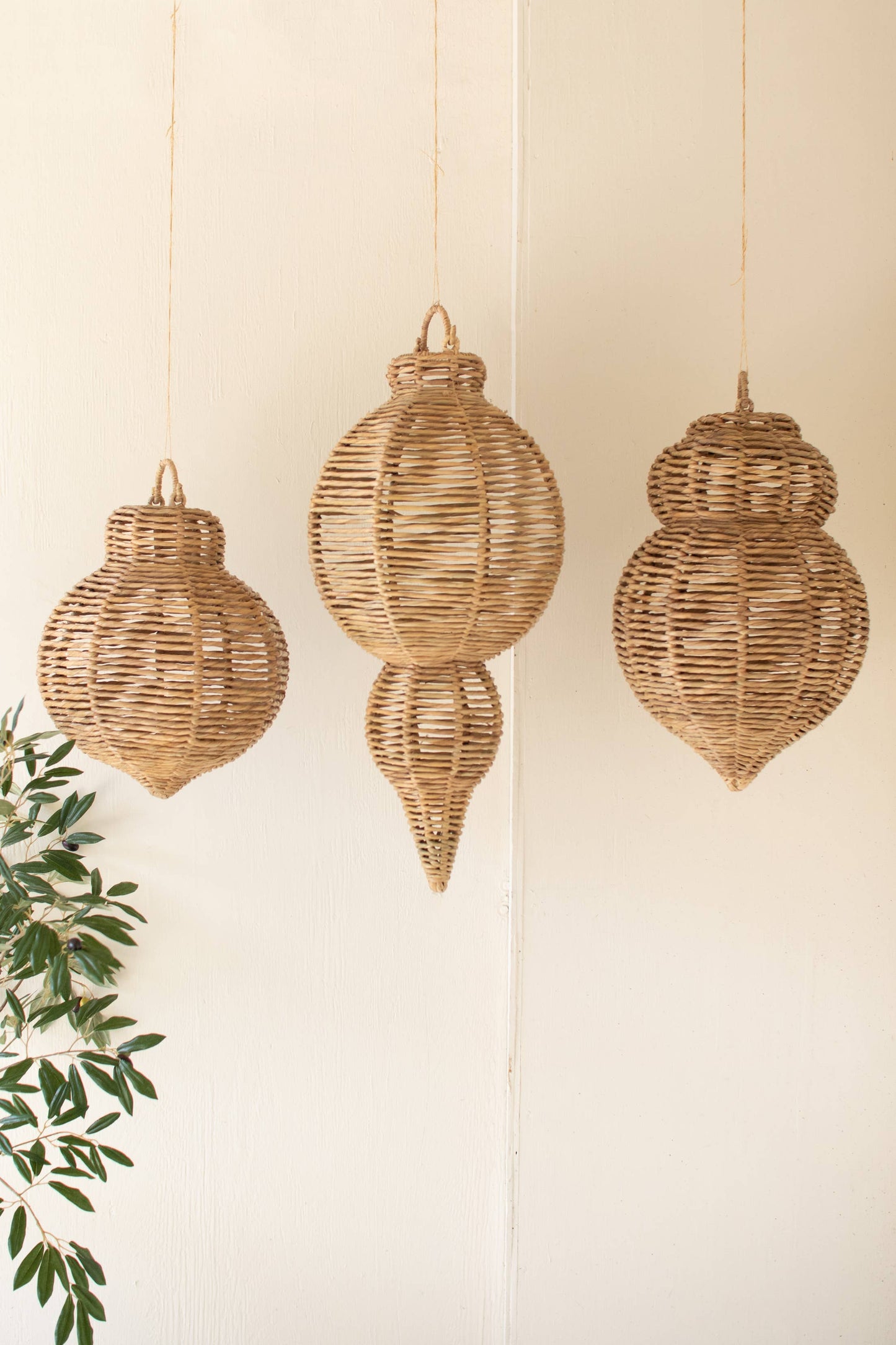 SET OF THREE LARGE WOVEN SEAGRASS AND IRON ORNAMENTS: Brown / Seagrass/Iron / Large: 14"d x 30.25"t;
Medium: 12"d x 21"t;
Small: 12"d x 17.75"t