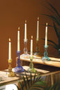SET OF SIX GLASS TAPER CANDLE HOLDERS: Multi / Glass / Large (3): 4”d x 8.5”t;  
Small (3): 3.5” x 6”t