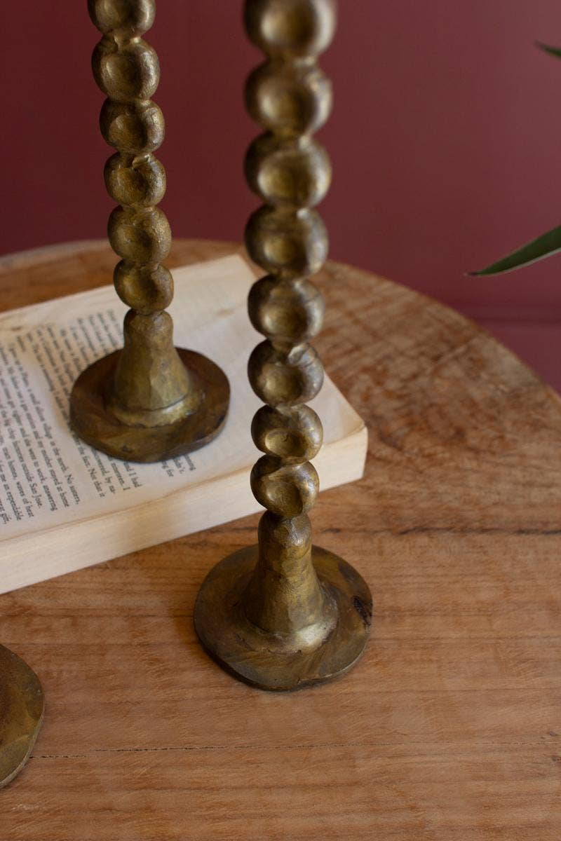 SET OF THREE ANTIQUE BRASS TAPER CANDLE HOLDER: Gold / Iron / Large (2): 2.5"d x 14.5"t;  
Small: 2.5"d x 10.25"t