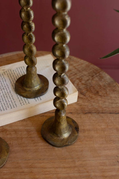 SET OF THREE ANTIQUE BRASS TAPER CANDLE HOLDER: Gold / Iron / Large (2): 2.5"d x 14.5"t;  
Small: 2.5"d x 10.25"t